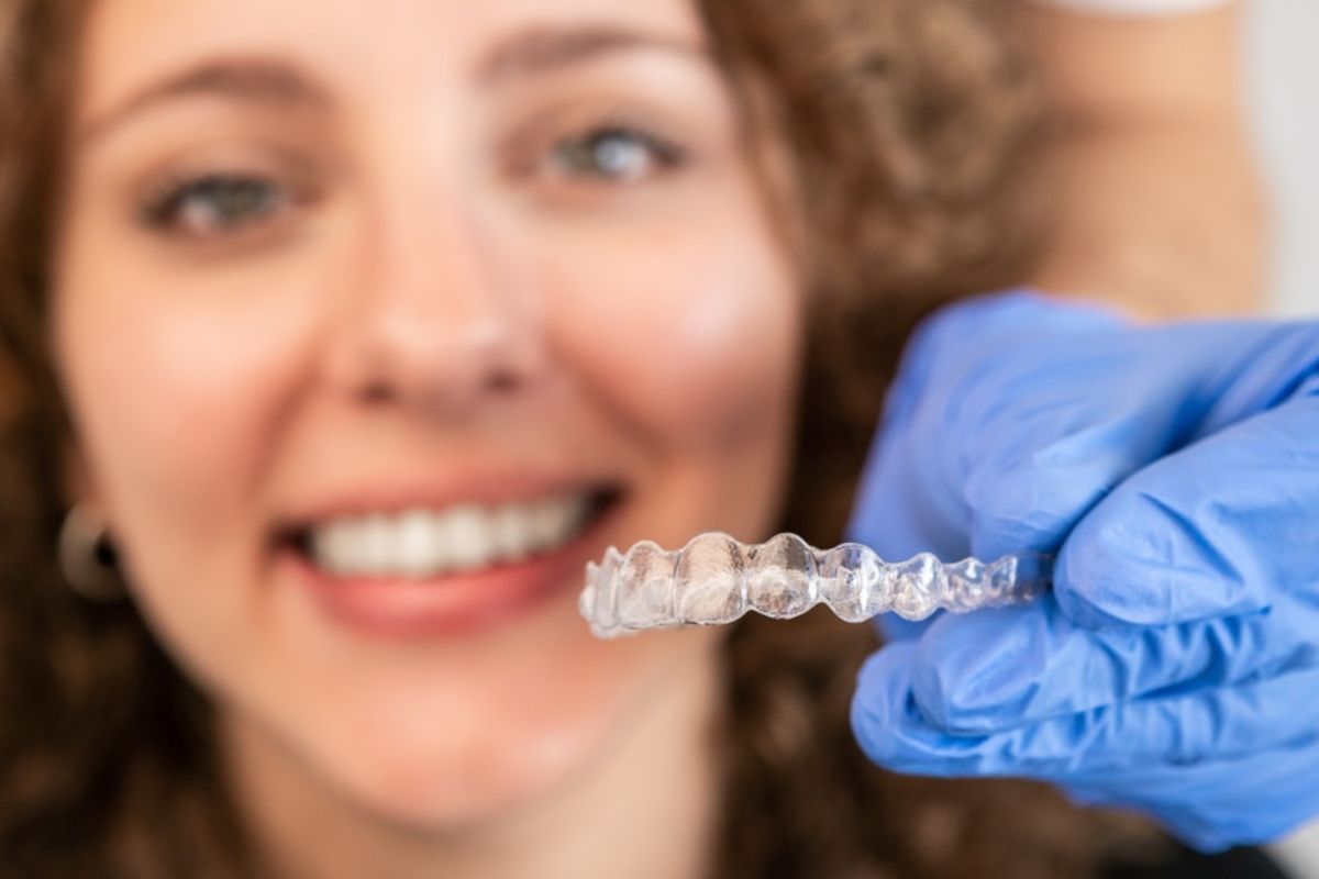 Patient wearing clear aligners during orthodontic Patient wearing clear aligners during orthodontic visit in Green Valley.