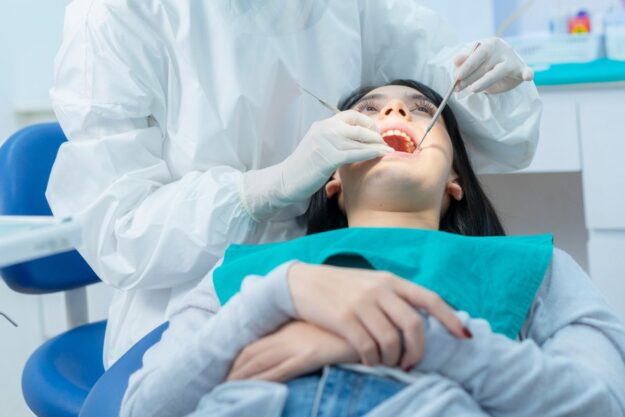 Patient receiving dental exam from a dentist in Sahuarita.