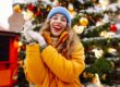 A smiling person during Christmas celebrations showing a confident, festive smile with Invisalign clear aligners.