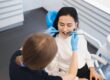 Female patient receiving a routine dental checkup at a family dental clinic for long-term oral health care.
