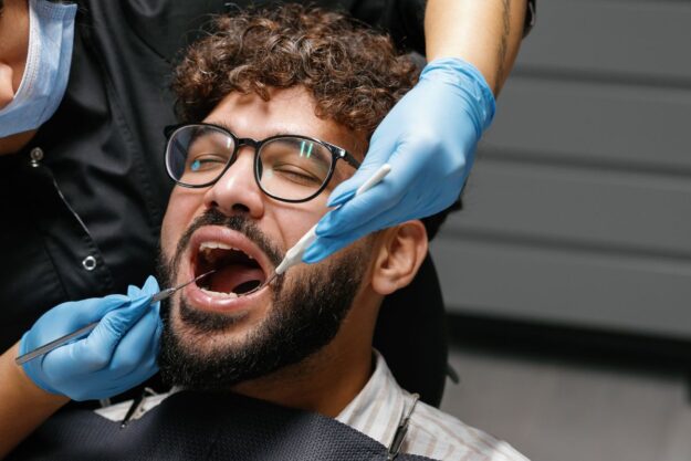 Patient receiving a routine dental checkup for healthy oral care.